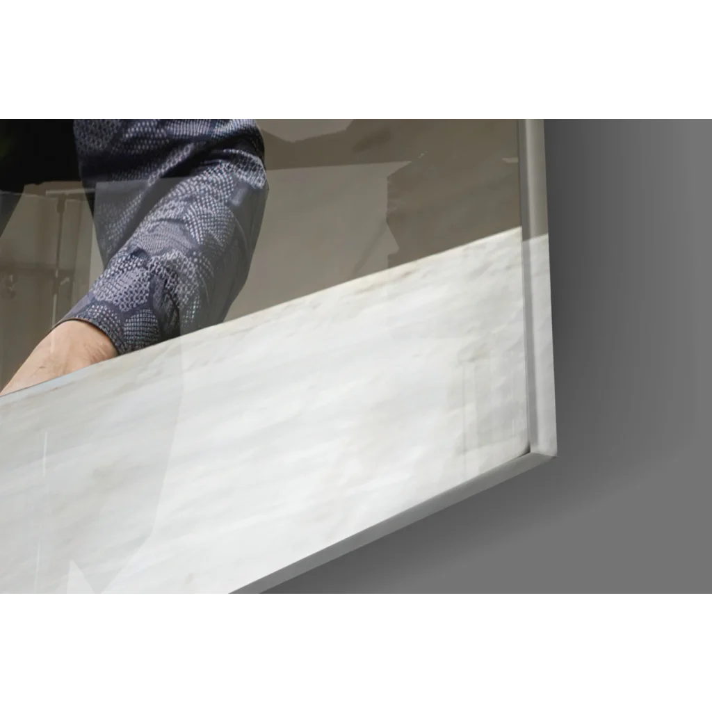 Batman Joker Showdown glass wall art on white marble countertop