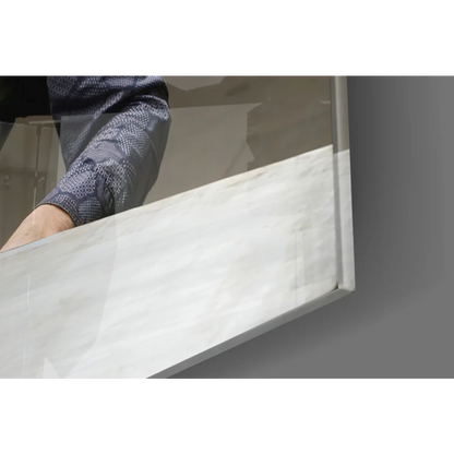 Batman Joker Showdown glass wall art on white marble countertop