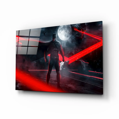 Black Batman figure with red lasers on moonlit glass wall art