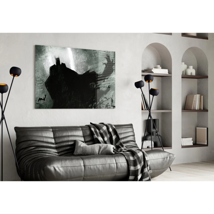 Batman silhouette wall art over black leather sofa with striped throw