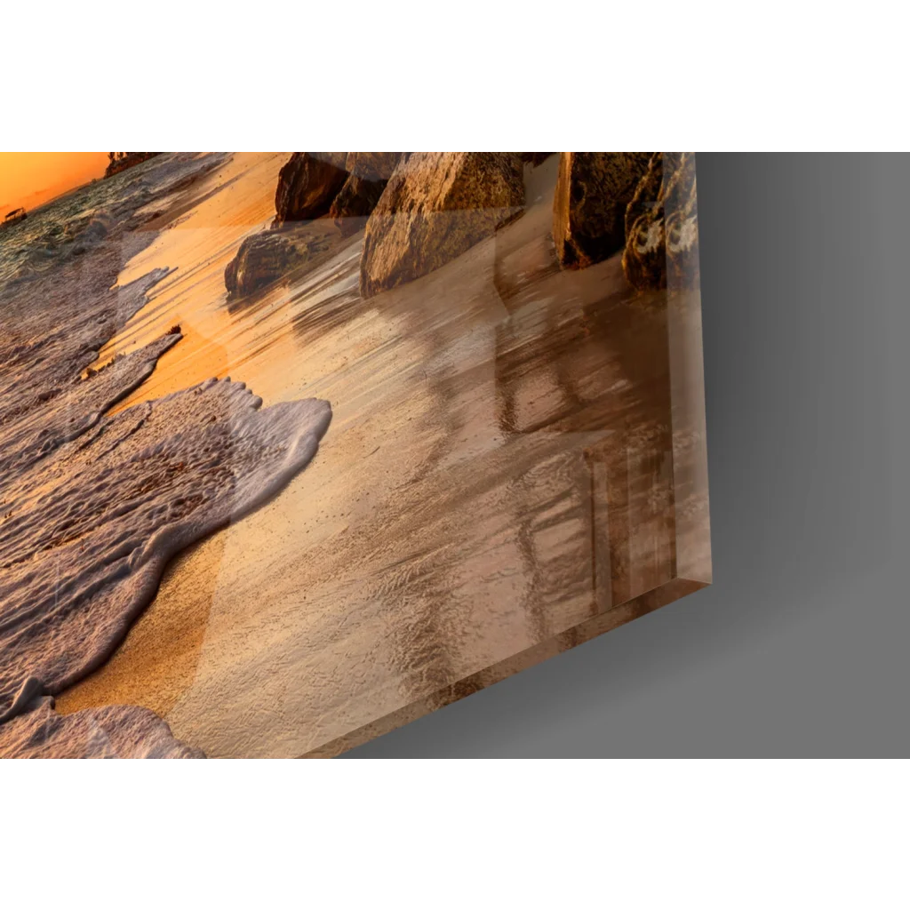 Tropical beach sunset glass wall art with serene waves and orange sky