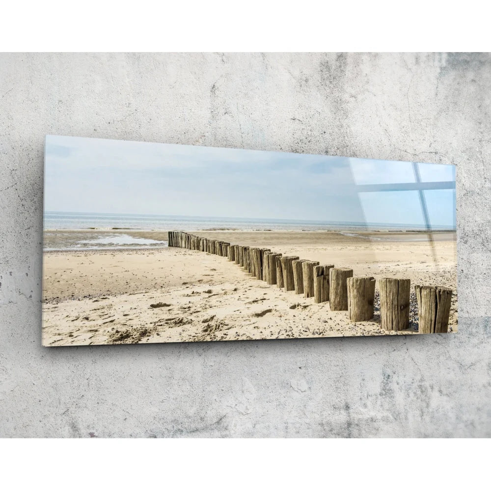 Stunning ocean pier glass wall art with weathered posts to sea