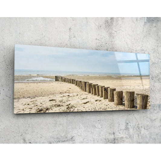 Stunning ocean pier glass wall art with weathered posts to sea