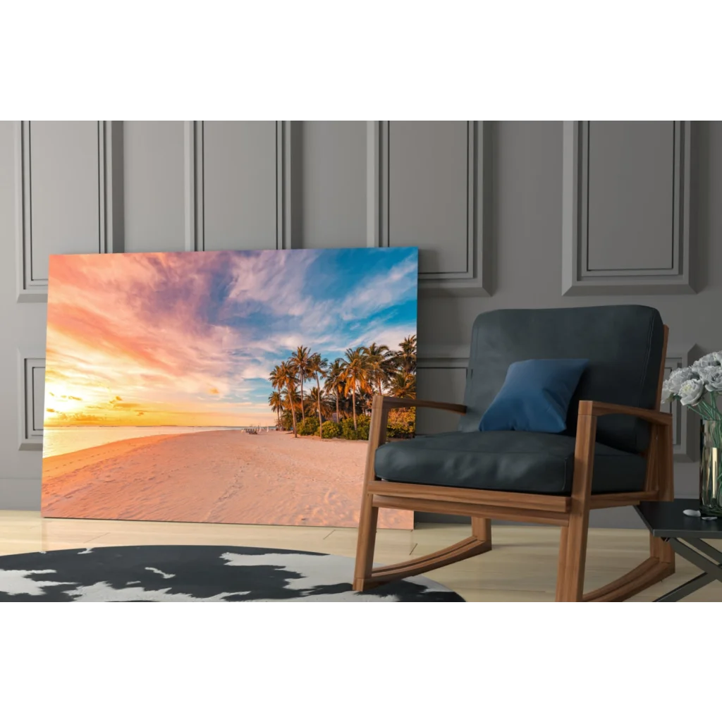Tropical sunset glass wall art with palm trees and vibrant sky