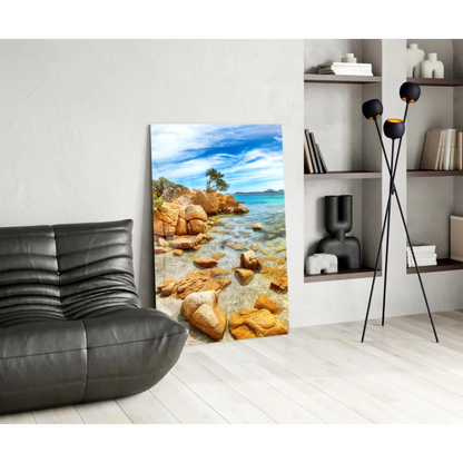 Vibrant turquoise waters glass wall art with golden rocks and lone tree