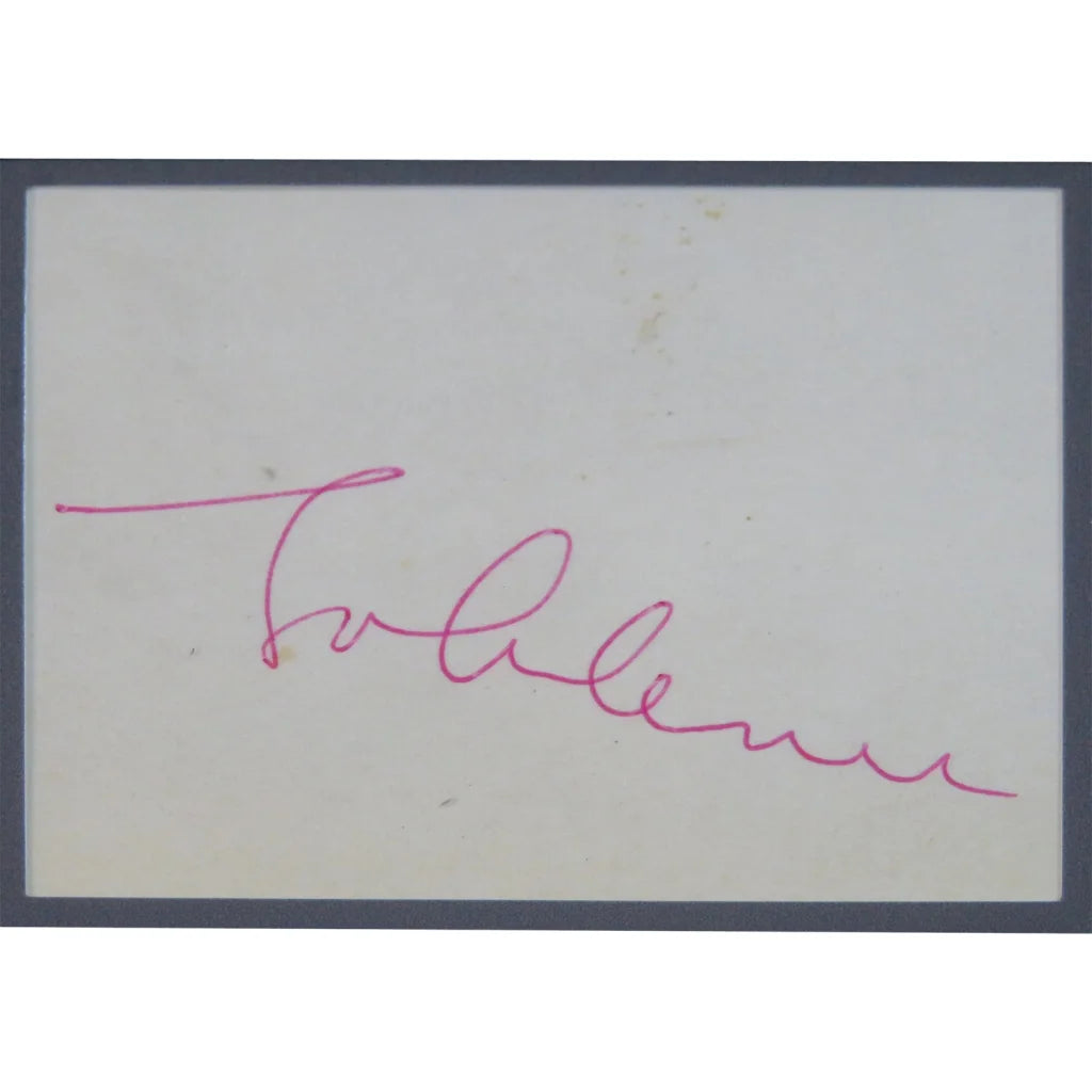 Beatles band autographed cut music display with pink cursive signature on white card, framed in dark gray