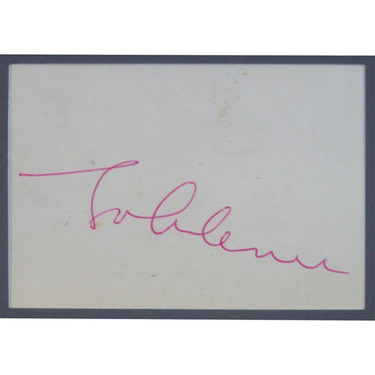 Beatles band autographed cut music display with pink cursive signature on white card, framed in dark gray