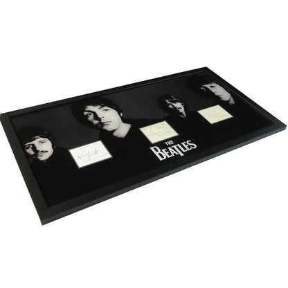Framed Beatles band autographed cut music display with signed portraits
