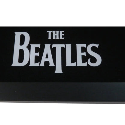 Black rectangular Beatles band autographed sticker in framed display