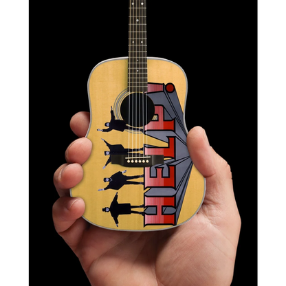 Yellow Beatles Help mini guitar by Axe Heaven® on adjustable A-frame stand