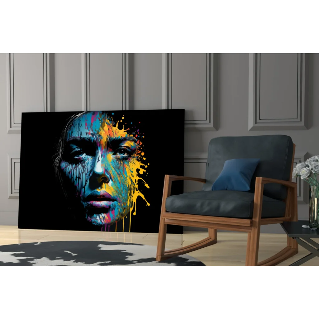 Vibrant abstract portrait canvas wall art of womans face with blue yellow pink paint splashes on black background