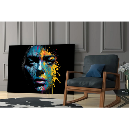 Vibrant abstract portrait canvas wall art of womans face with blue yellow pink paint splashes on black background