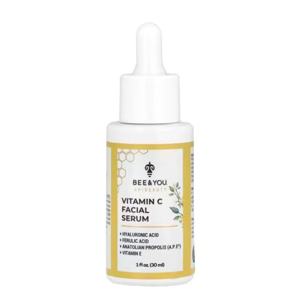 Bee & You vitamin C facial serum in white glass bottle with dropper