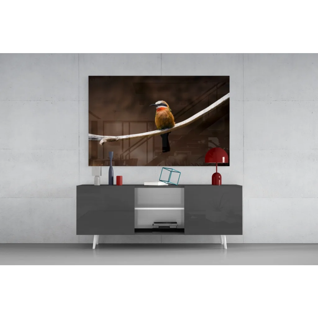 Vibrant orange bird wall art on glass, framed photo of bird on branch