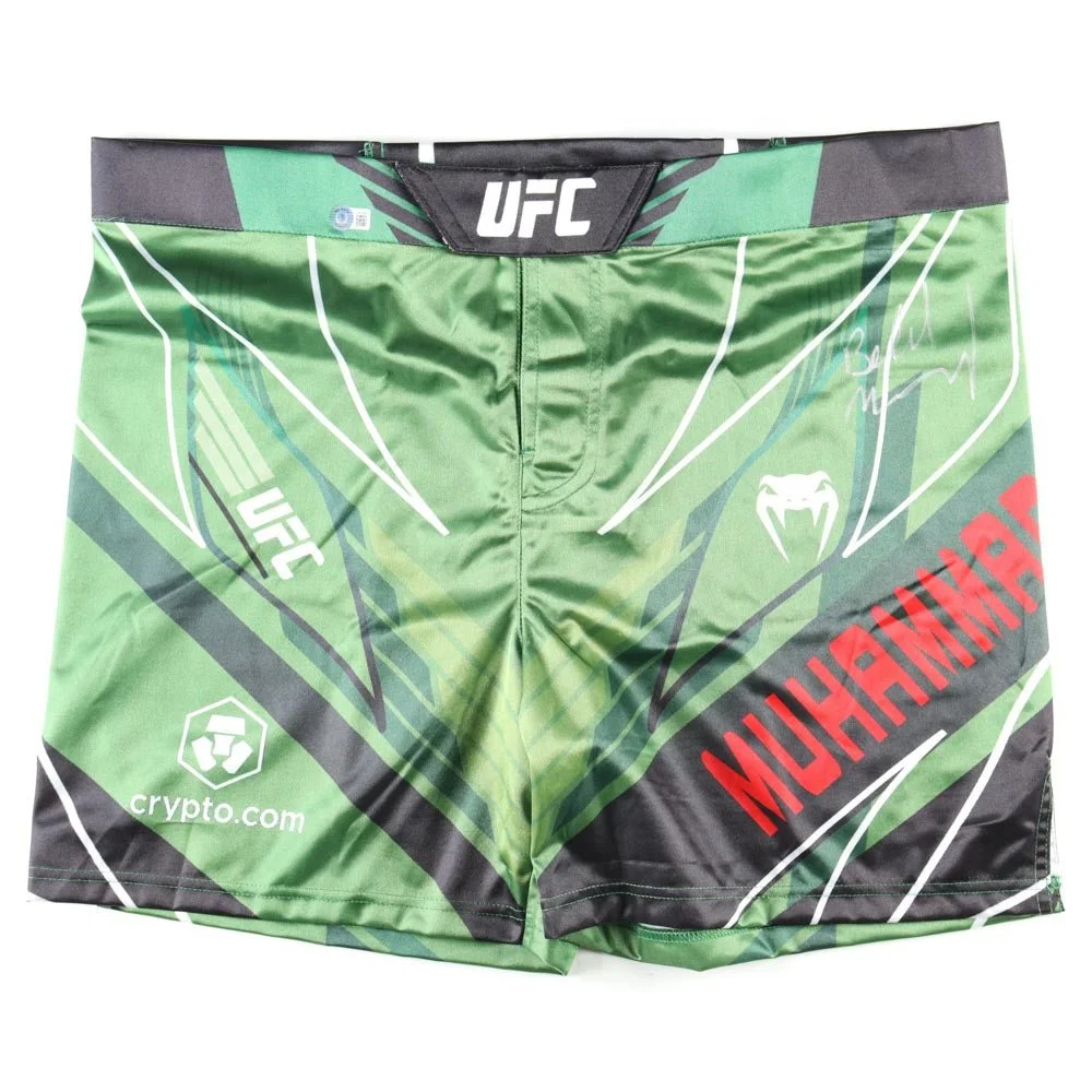 Green and black Belal Muhammad signed UFC trunks with white and red accents