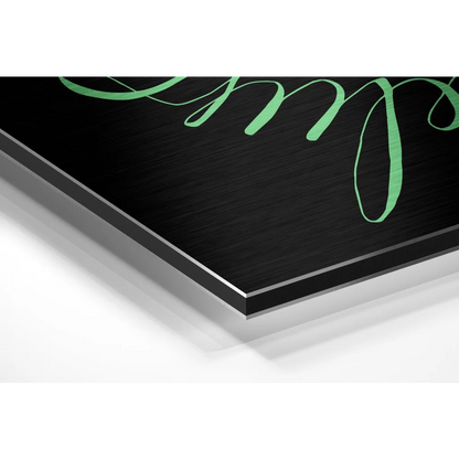 Black and green ribbon art on Believe in Impossible brushed aluminium dibond wall art