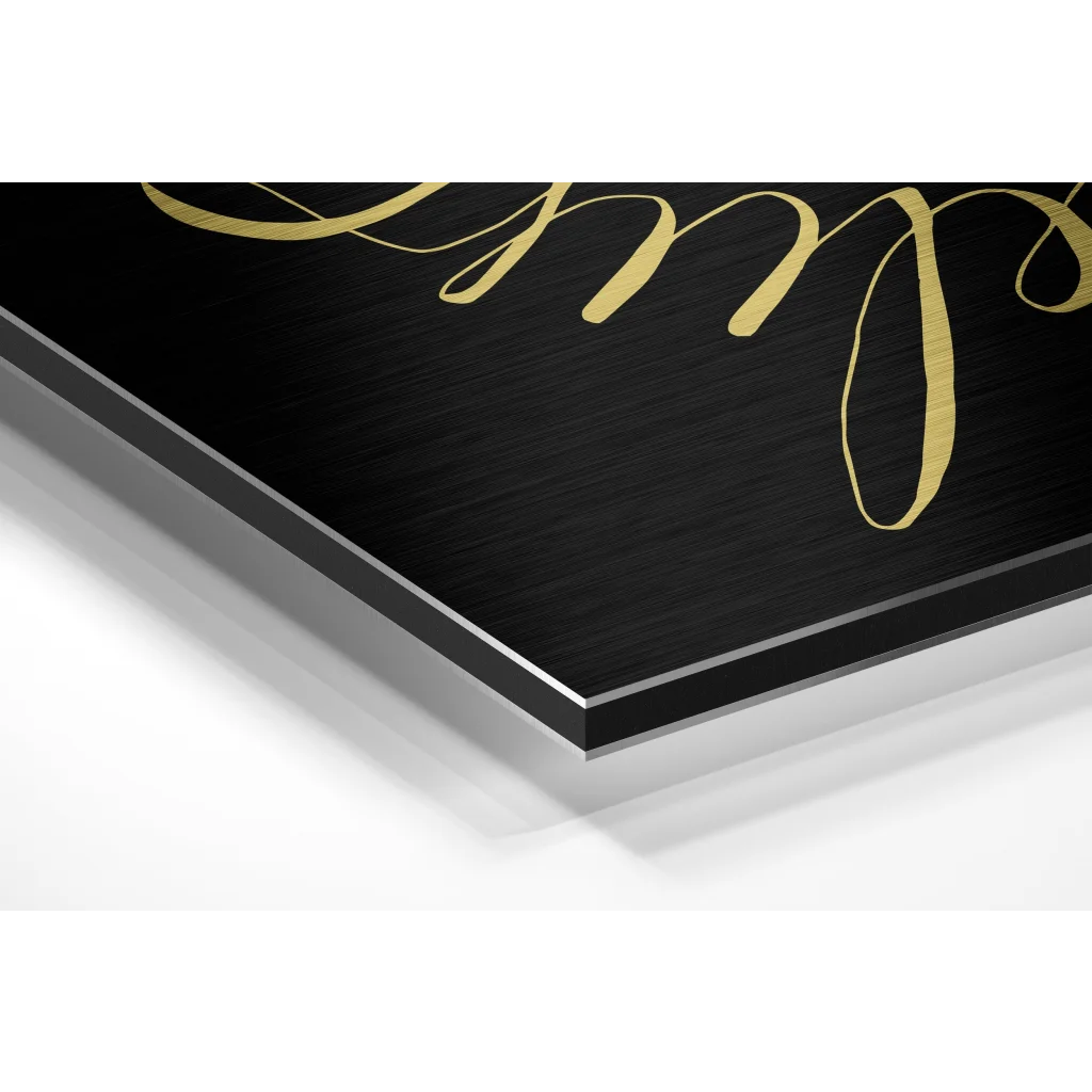Black metal plaque with gold cursive on brushed aluminium dibond wall art