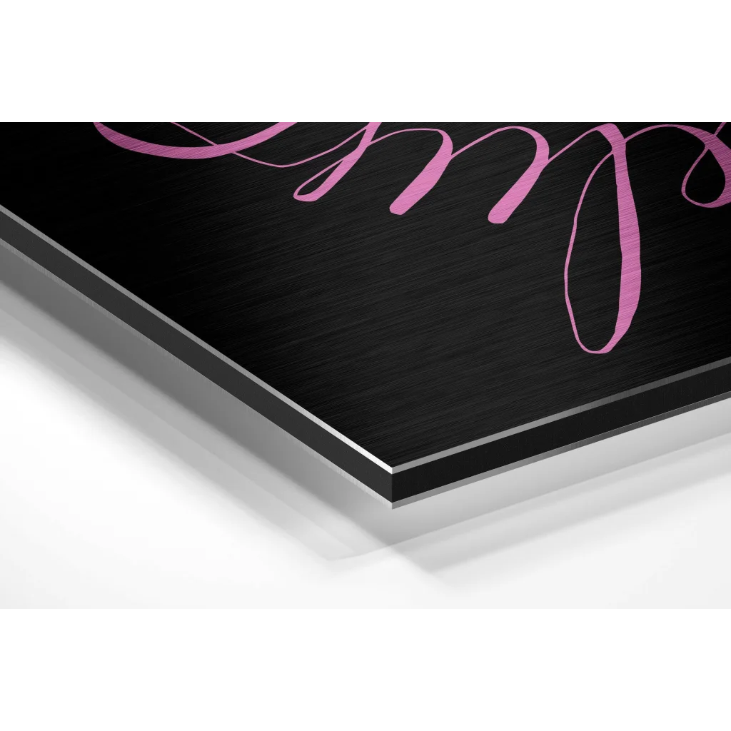 Black metal print with pink cursive on Believe in the Impossible brushed aluminium dibond wall art