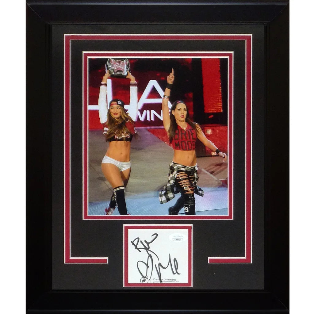 Autographed Bella Twins Brie and Nikki Bella WWE photo in black frame