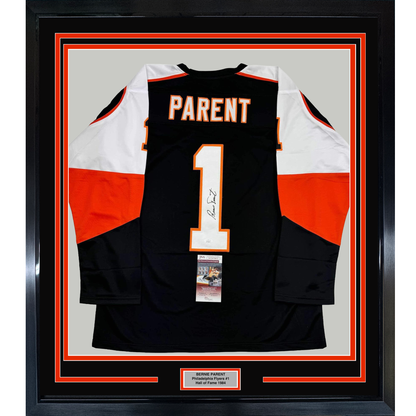 Framed black Philadelphia Flyers hockey jersey #1 with "PARENT" nameplate, signed, displaying front view with red and white sleeve panels and JSA authentication certificate.
