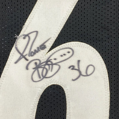Black custom jersey with white numbers and signatures from a professional sports league
