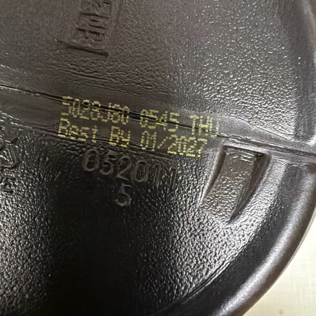 Black textured cast iron skillet with raw lit 250mg caffeine markings