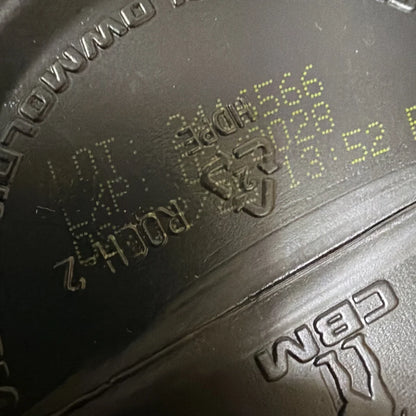 Black rubber tire sidewall with yellow dot matrix code, Raw Lit Pre workout powder