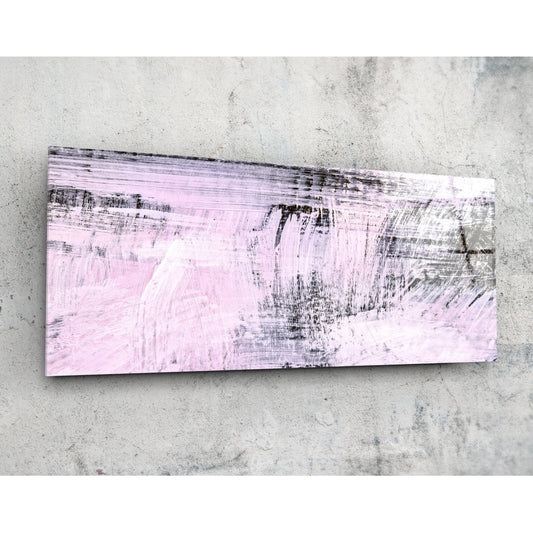 Horizontal abstract glass wall art with blush pink and charcoal brushstrokes mounted on concrete wall.