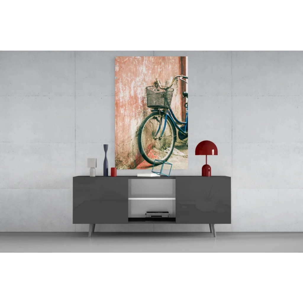 Blue bicycle against pink wall in stunning glass wall art print