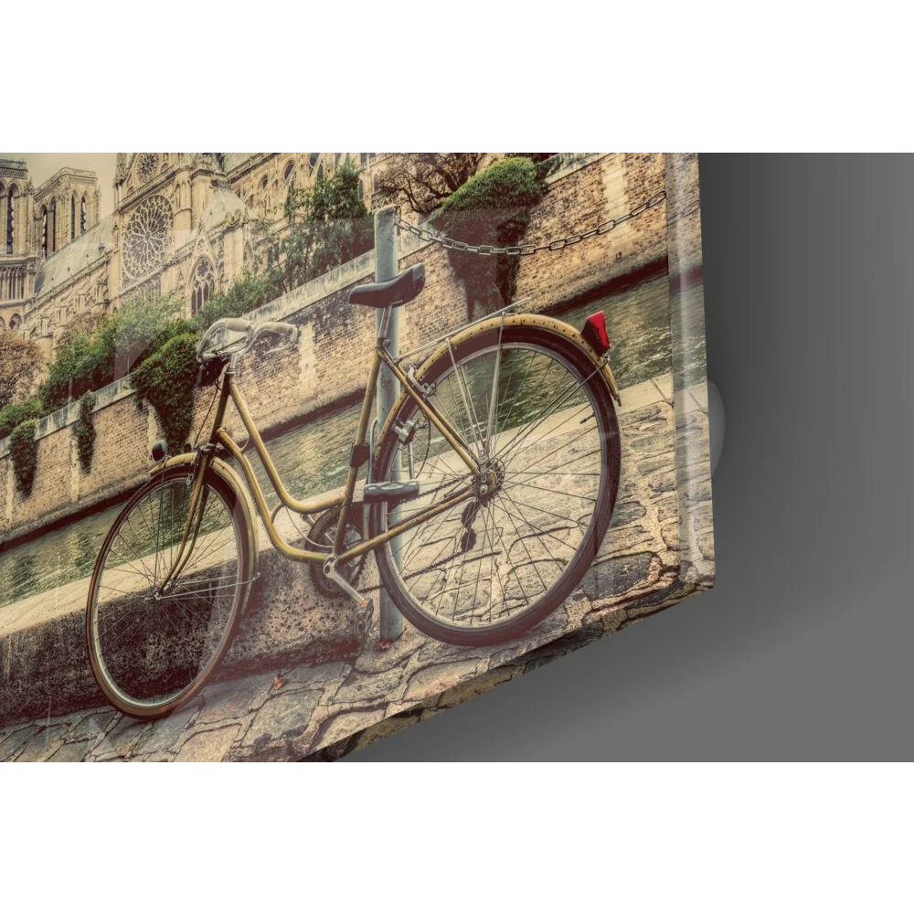 Vintage yellow bicycle by canal on glass wall art print