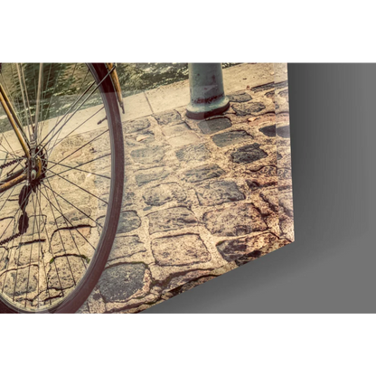 Vintage bicycle wheel on cobblestones, Parisian Notre Dame wall art
