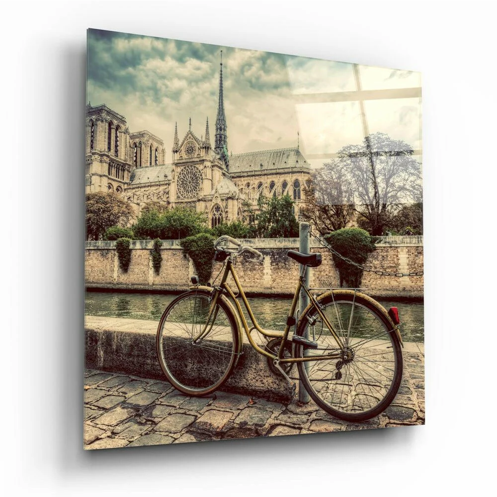 Vintage yellow bicycle by Notre Dame on glass wall art print