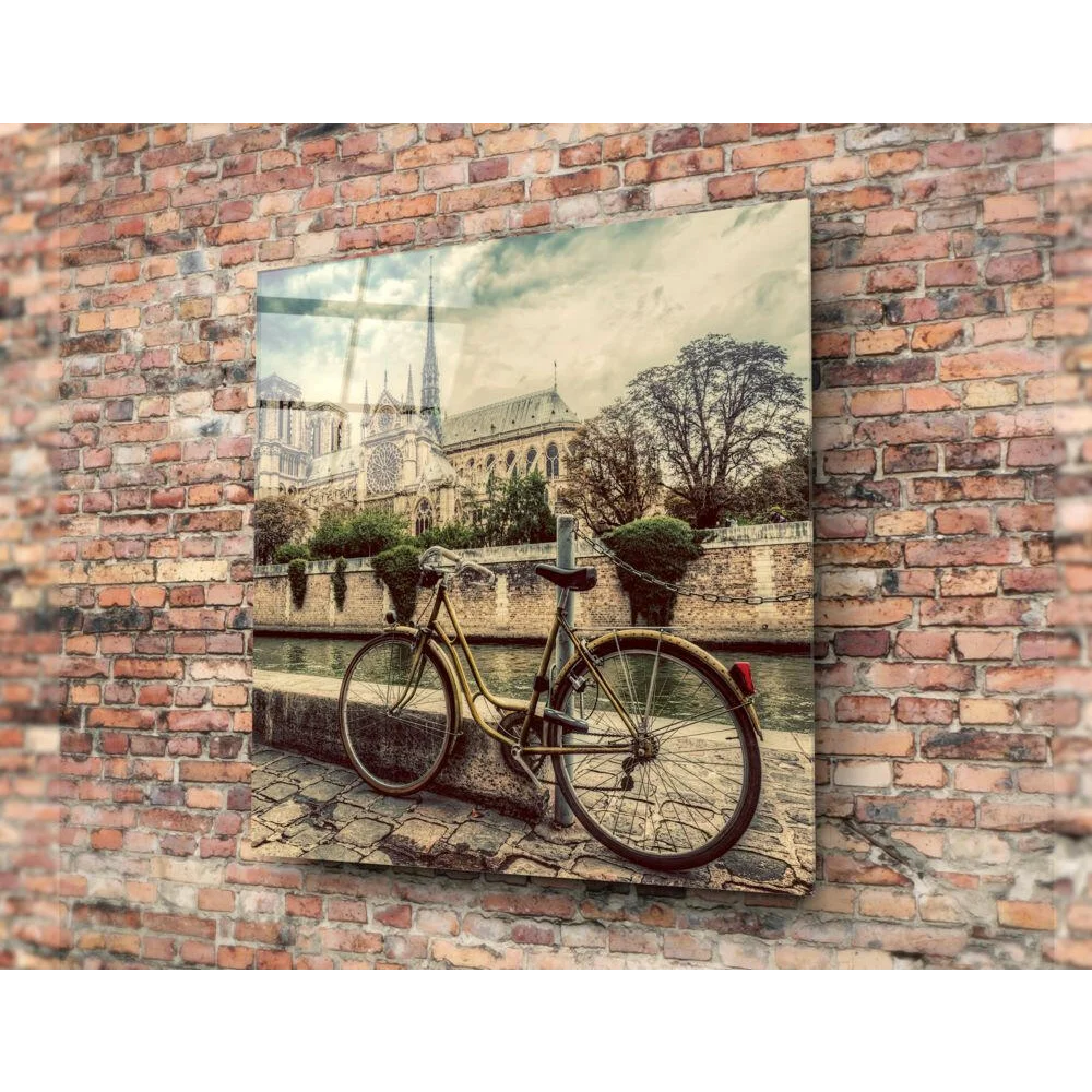 Sepia-toned vintage yellow bicycle on brick wall glass wall art print