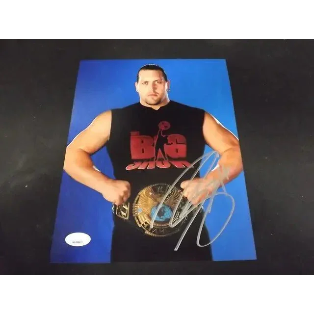 Autographed Big Show signed 8x10 photo with JSA COA holding a championship belt