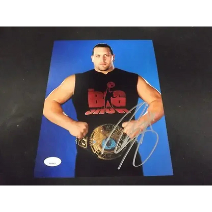 Autographed Big Show signed 8x10 photo with JSA COA holding a championship belt