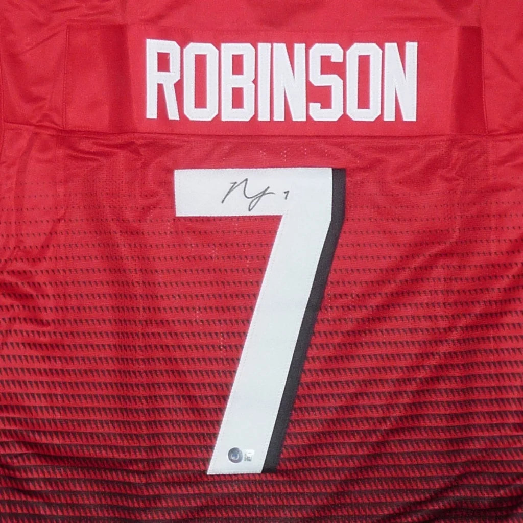 Bijan Robinson autographed red Atlanta Falcons jersey with white number 7
