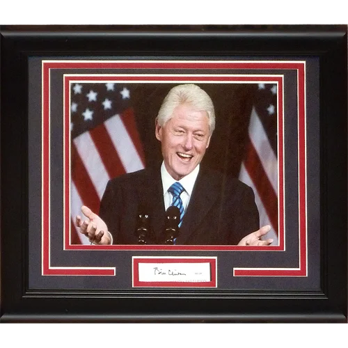 Black-framed clinton autographed president signature series frame with photograph and american flag backdrop by JSA