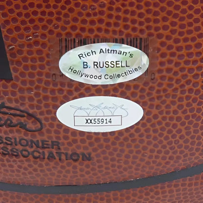 Bill Russell autographed brown leather NBA basketball with Hollywood Collectibles branding