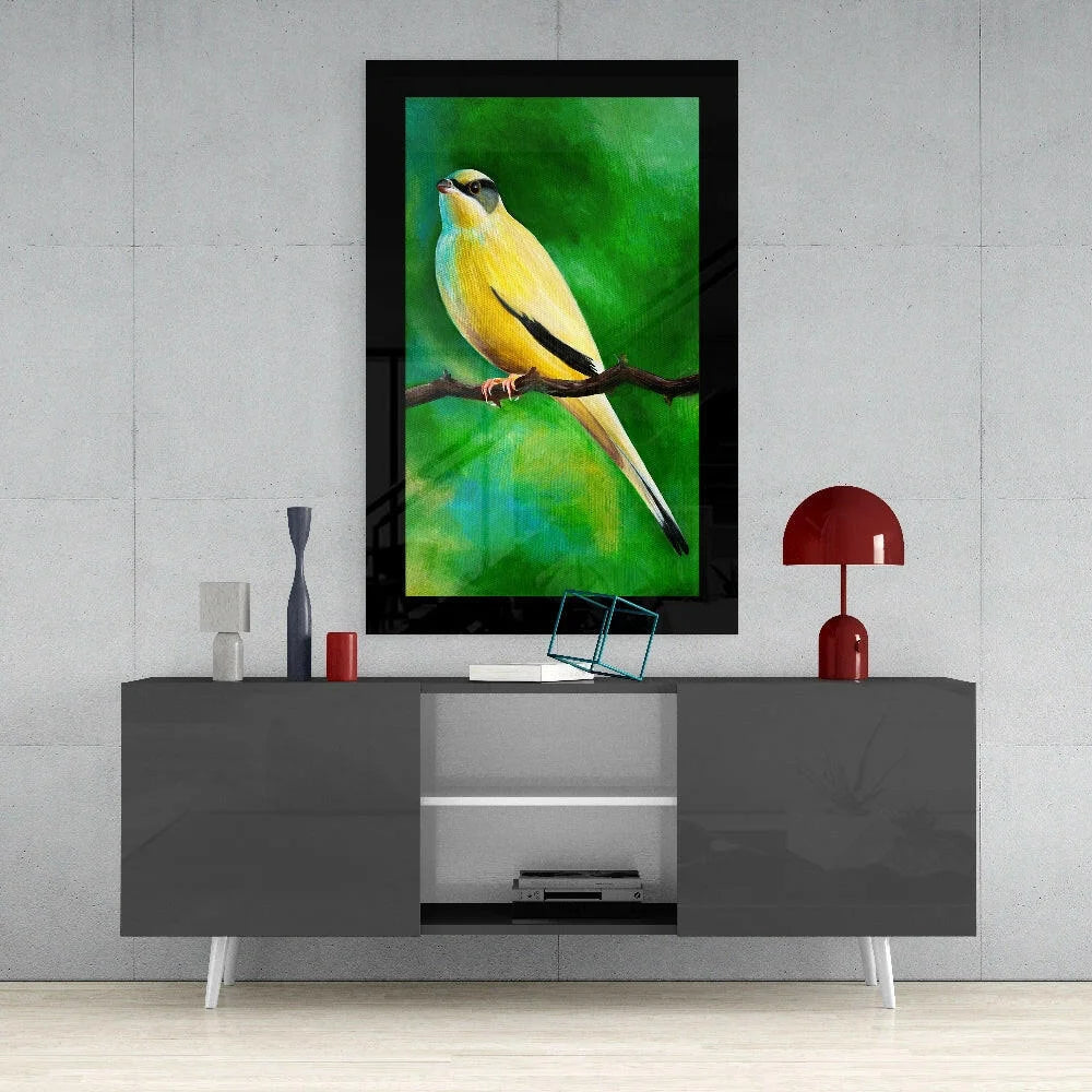 Vibrant yellow bird wall art on bold green background in sleek black frame