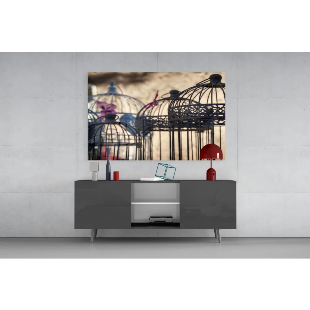 Stunning birdcage glass wall art with flowers atop gray console