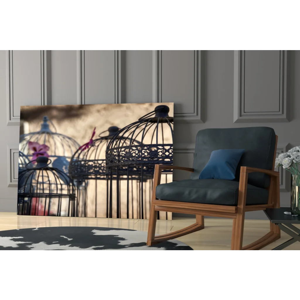 Stunning black metal birdcage wall art with flowers and ornate lattice on warm background
