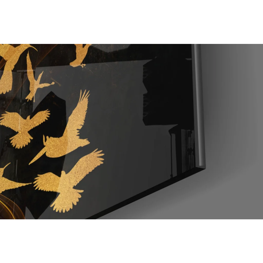 Stunning glass wall art with black framed golden bird silhouettes in flight