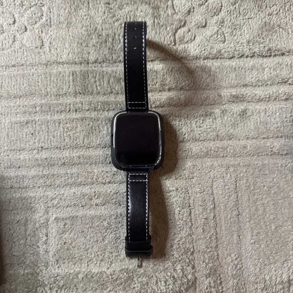 Bit Smart Watch Model S1 black leather strap with white stitching
