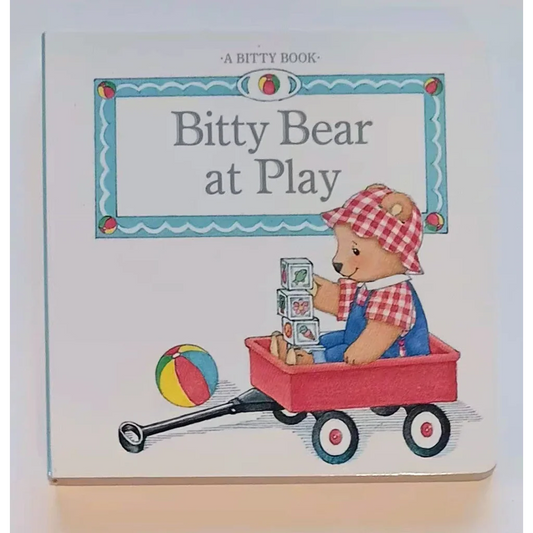 Bitty Baby board book of bear in overalls playing with blocks