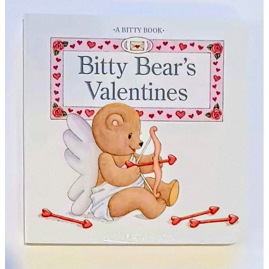 Cute Bitty Baby bear in diaper with wings holds arrow on valentines board book cover