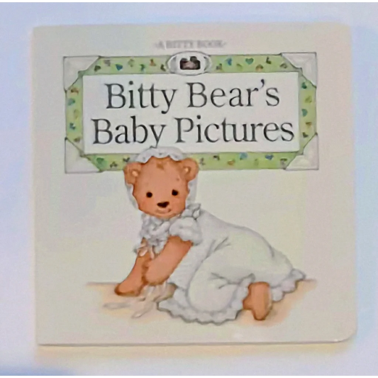 Charming Bitty Bear baby pictures book cover with teddy in white attire