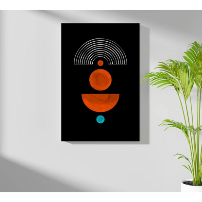 Black abstract circles aluminum print with orange teal accents on wall