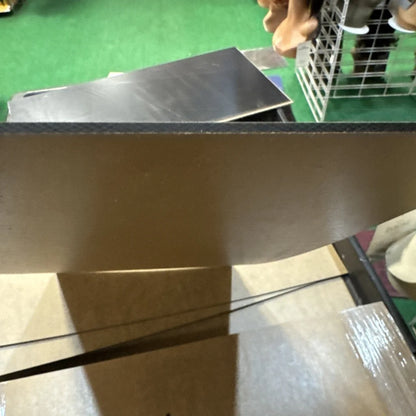 Black acrylic sheet 12x24 in brown cardboard box with black edge