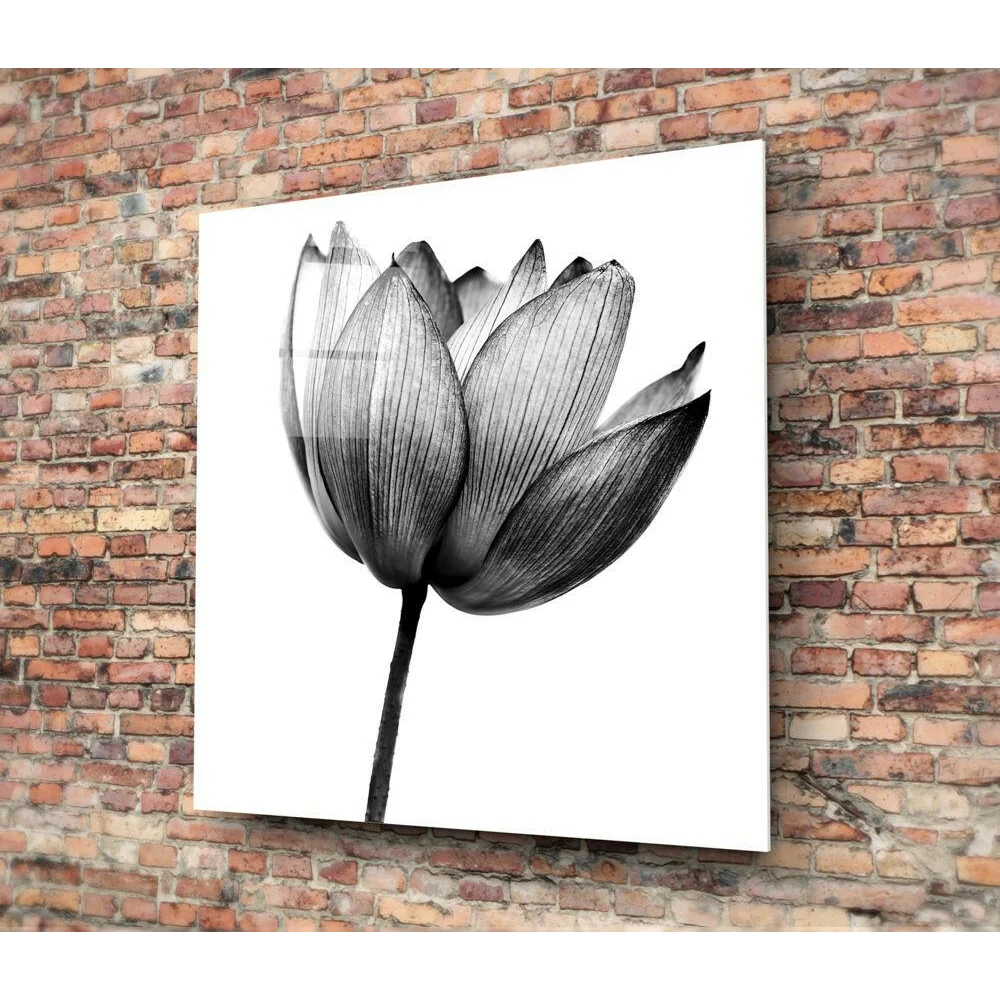 Black and white tulip canvas wall art print on brick wall