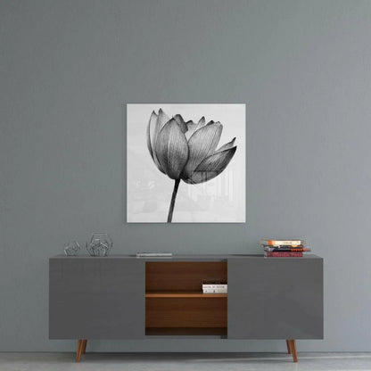 Black and white lotus canvas wall art print on gray wall